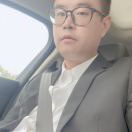 廖*